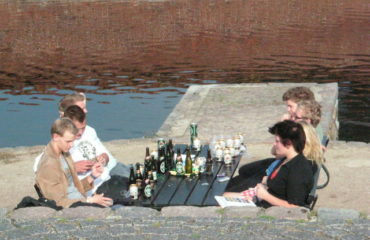 Teens drinking on a summer day.