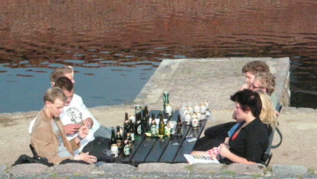 Teens drinking on a summer day.